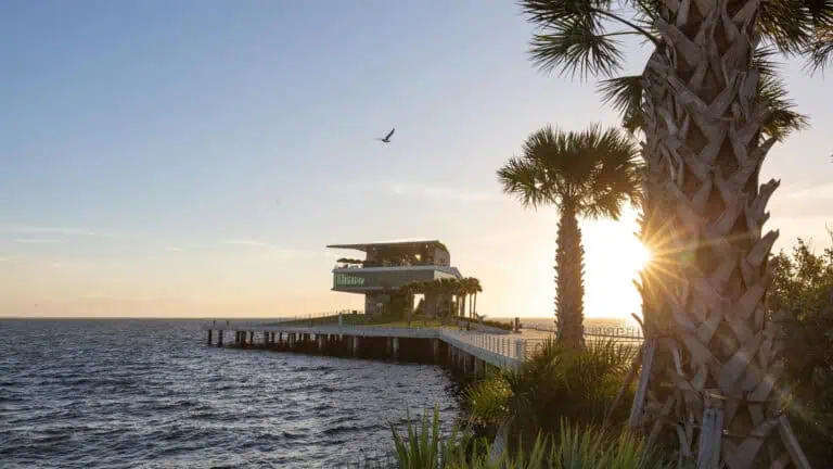 a pier at sunrise