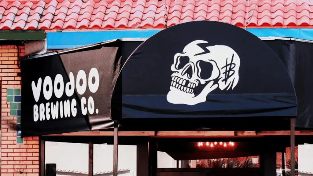 black awning with a white skull on it.