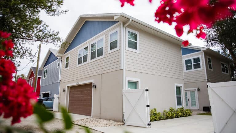 a garage with an apartment unit built above