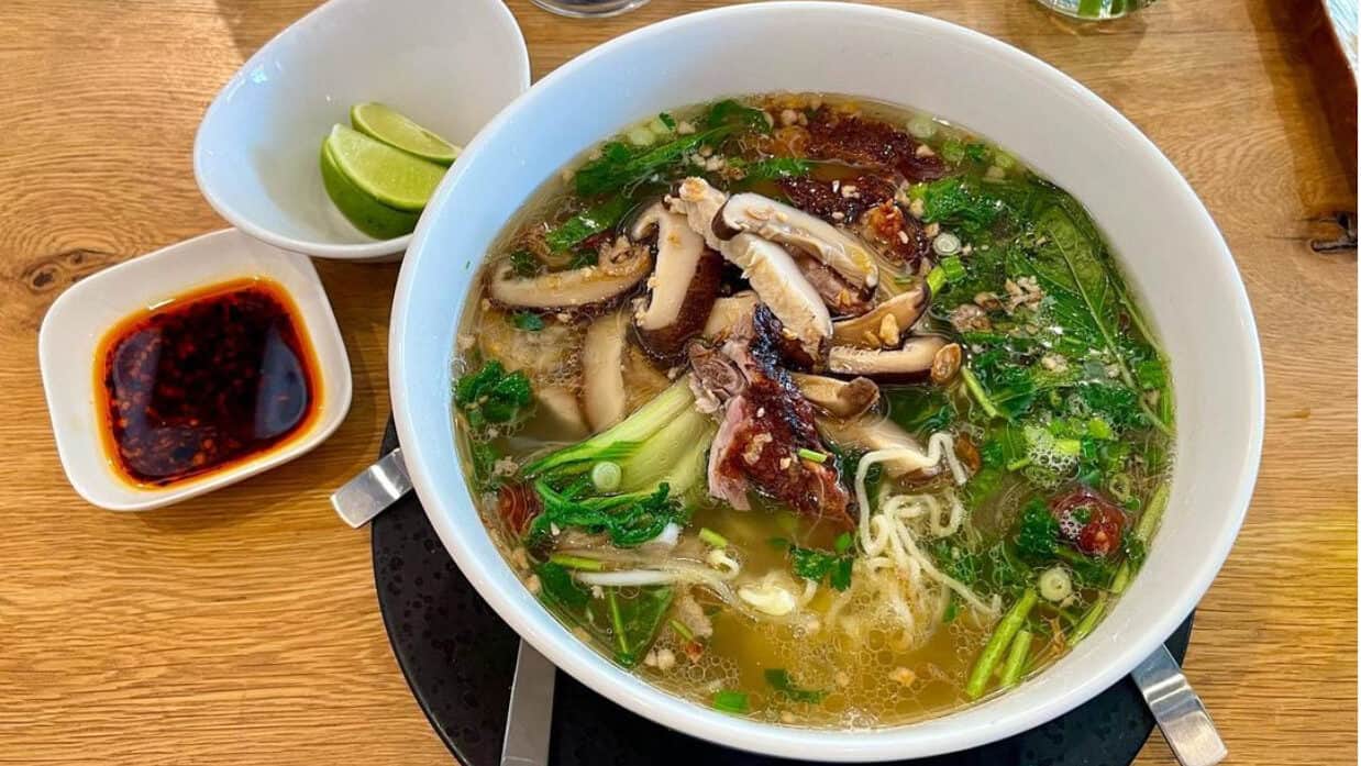 A large bowl of Duck Noodle Soup from The Glass Noodle restaurant.