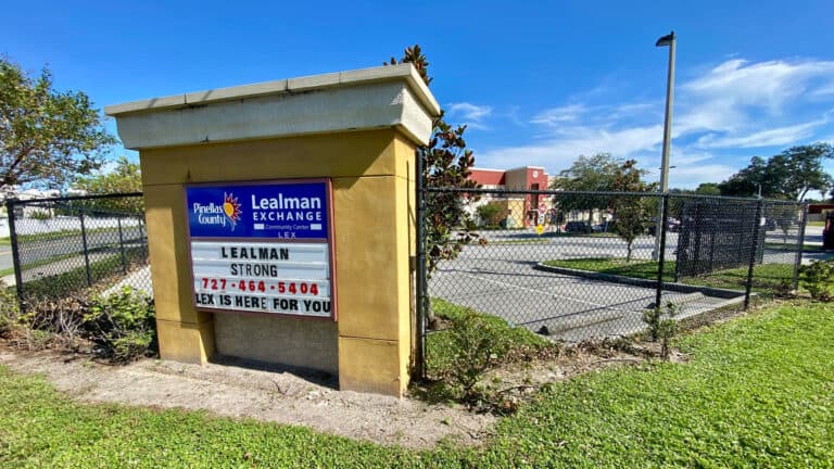 exterior of a community center with a sign that reads "Lealman Exchange"