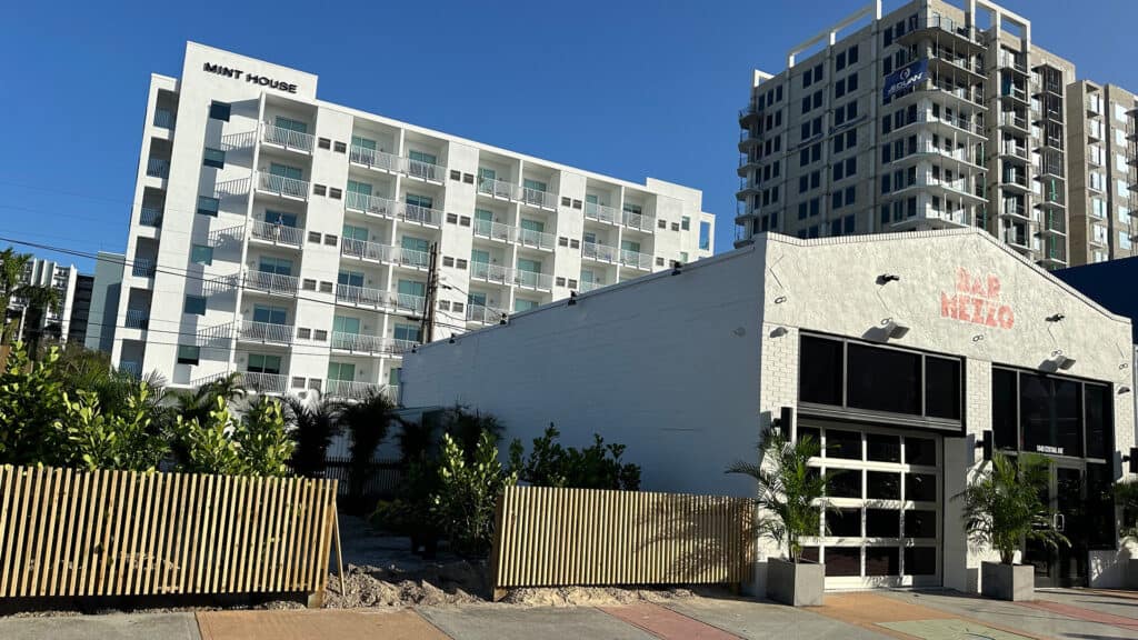 exterior of a bar with a patio area outside