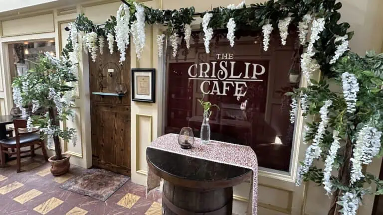 a wine window covered in flowers