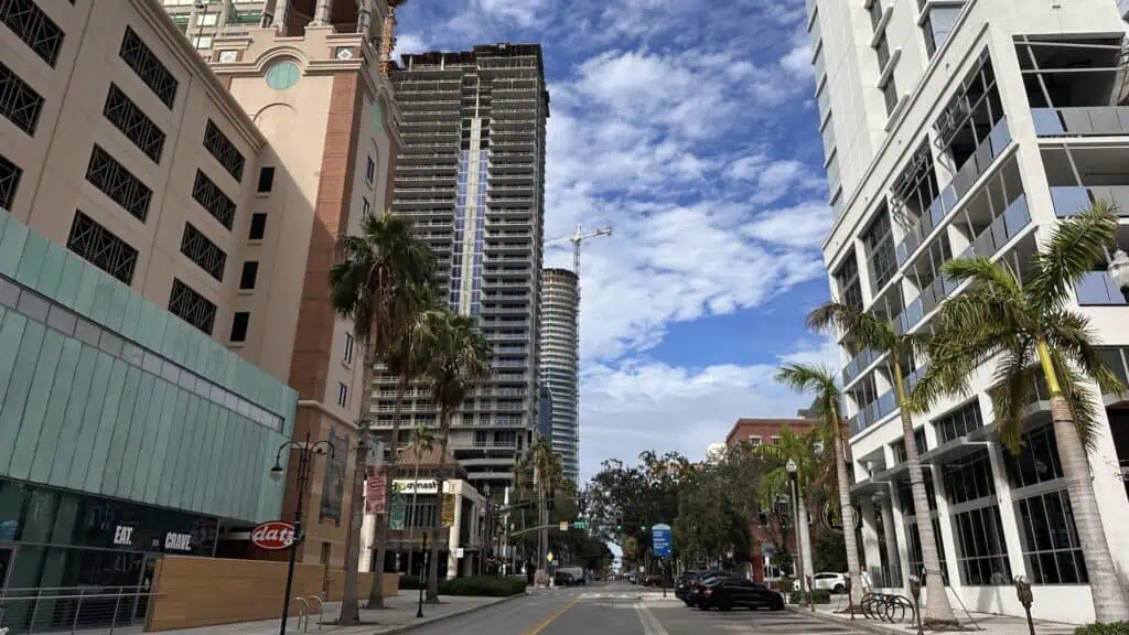 downtown area with large pink building to the left, office buildings to the right