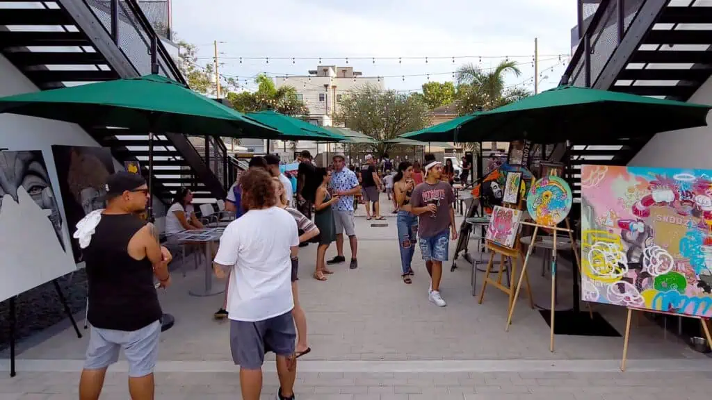 people walking through market