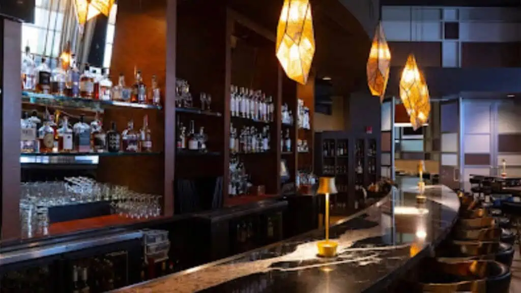 interior of a restaurant with a rounded bar