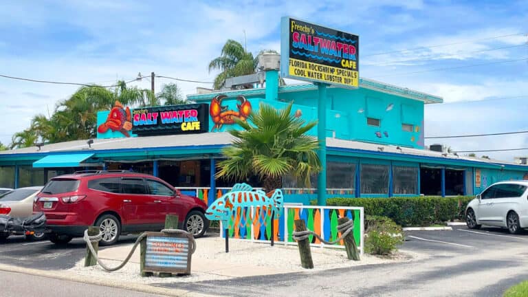 exterior of a saltwater cafe with a blue paint job