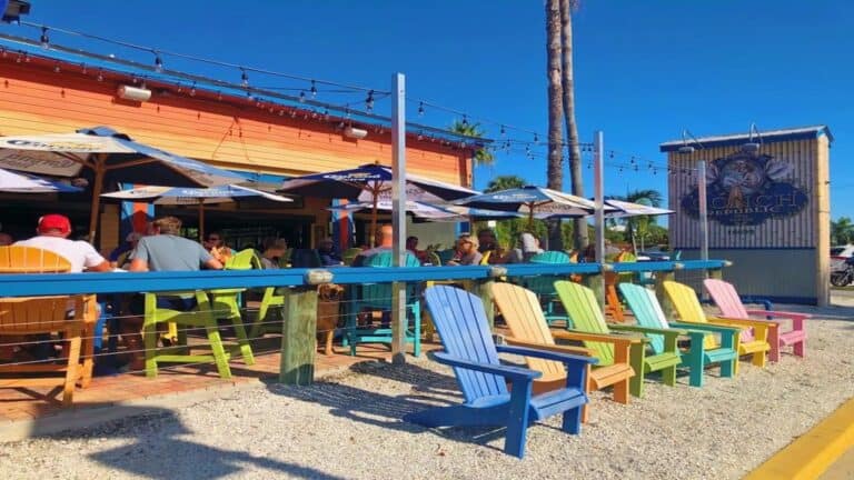 different colored seats on the beach