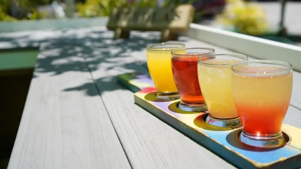 a flight of drinks on a table