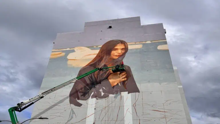 painting of woman on side of building