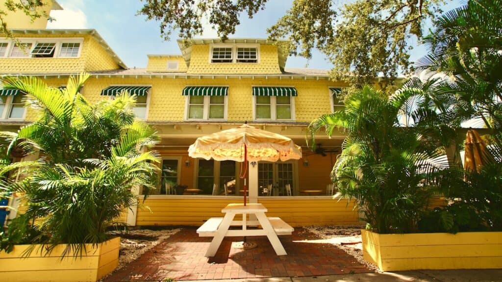 Exterior a bed and breakfast with a yellow paint job 