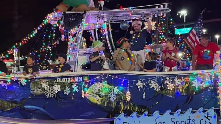 a boat covered in holiday lights