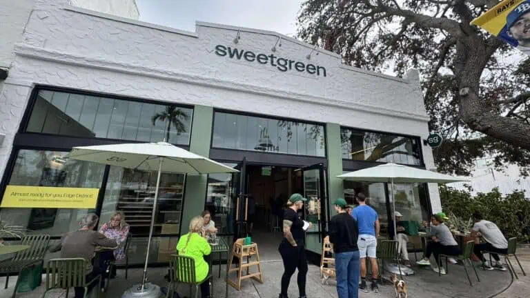 exterior of a restaurant with "Sweet Green" written above the front entrance