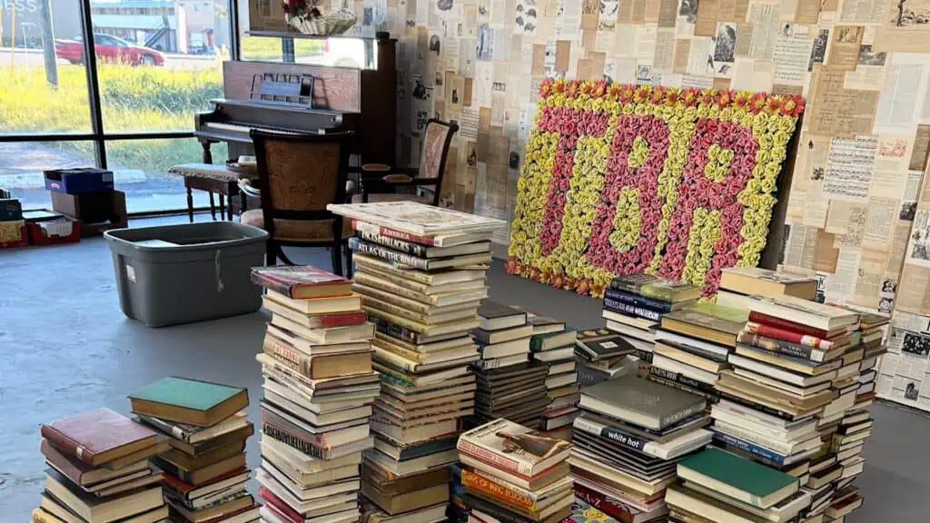 a pile of books inside a store. 