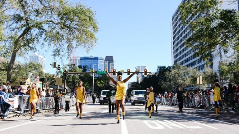 a marching band performs in a parade