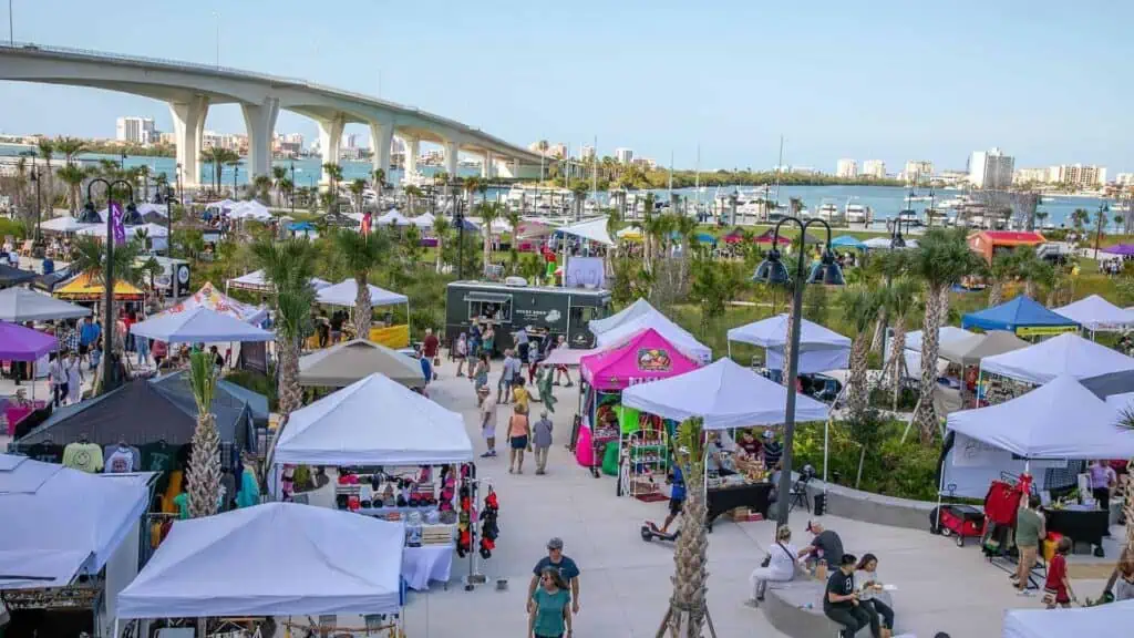 aerial view of a waterfront farmers market 