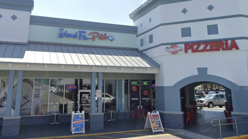 exterior of a poke restaurant in a large strip plaza