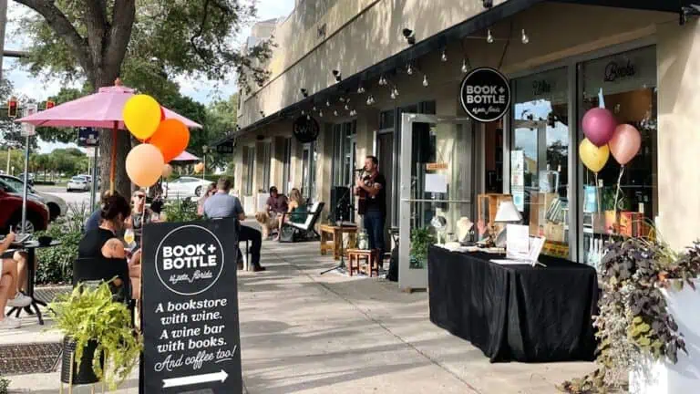 exterior of a bookstore with decorations on a bookstore sign.