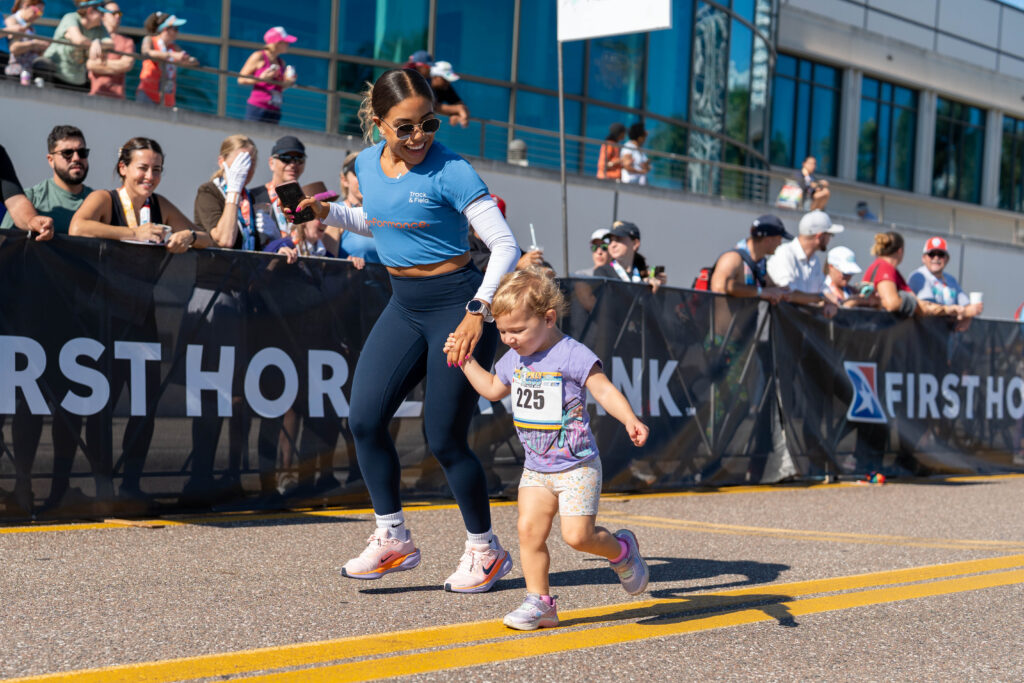 A mother and child on a kids run at St. Pete Run Fest