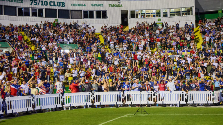 People at a soccer stadium
