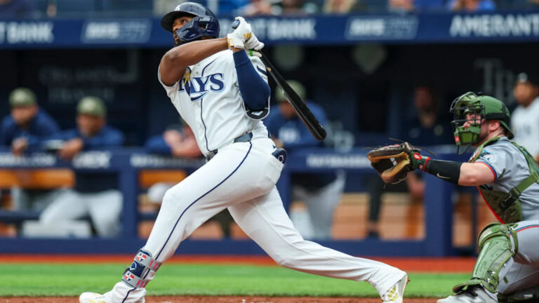 baseball player taking a swing