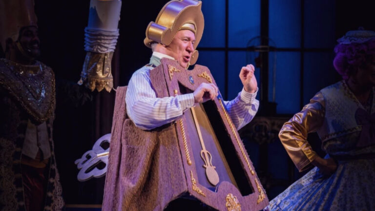 Man in an extravagant costume on stage