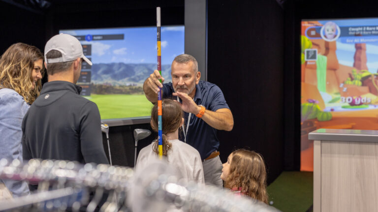 People in a golf store