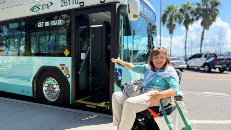 A person getting on a PSTA bus