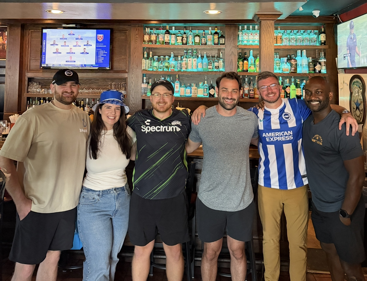 People at a soccer watch party