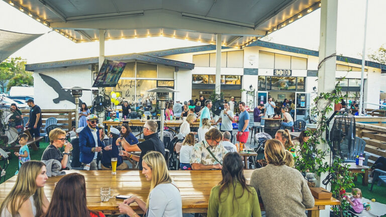 People outside Golden Isles Brewing in St. Pete
